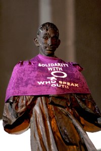 gandhi dressed in purple