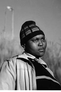 Busi Sigasa (2006) Photo by taken at Constitution Hill by Zanele Muholi, as part of the first Faces & Phases series