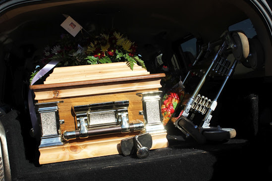 Before the coffin was lowered