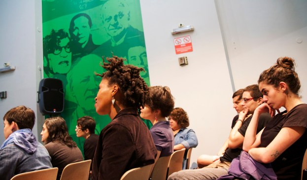 Members of the audience listening attentively...