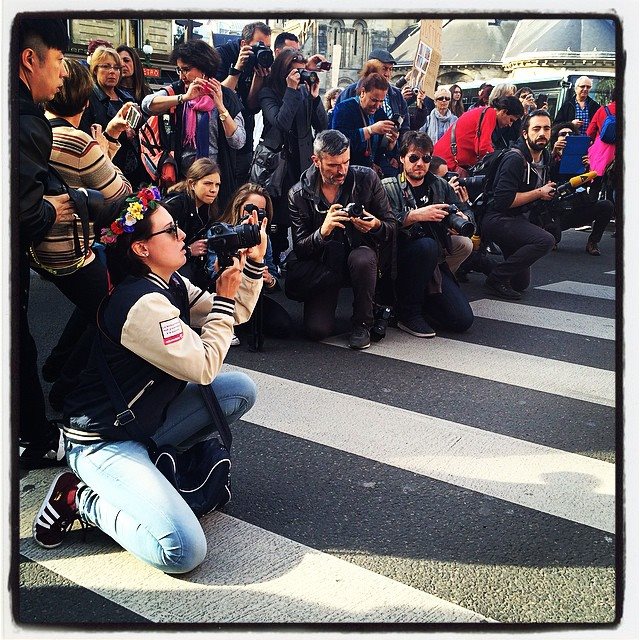 male photographers on intl women s day march in paris
