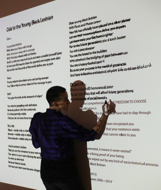 2015 Sept. 10 Vladica writing on wall_2852