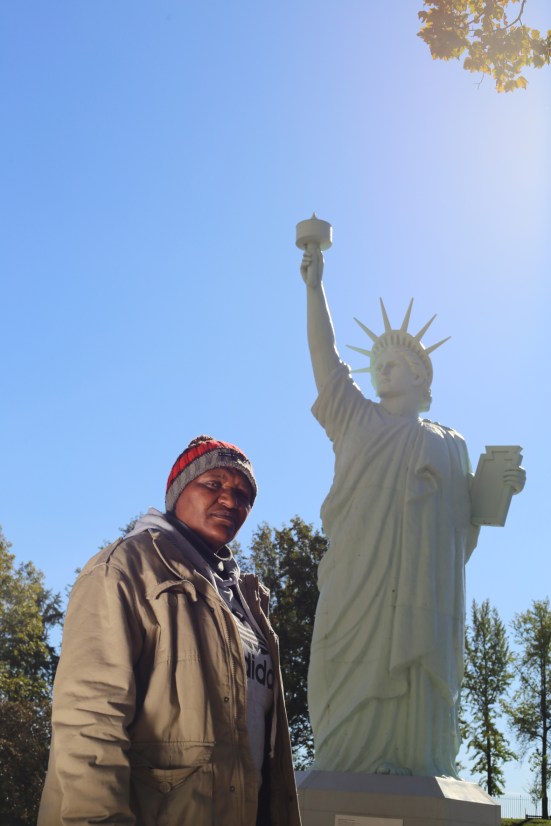 2015 Oct. 20 Funeka next to Statue of Liberty_7459